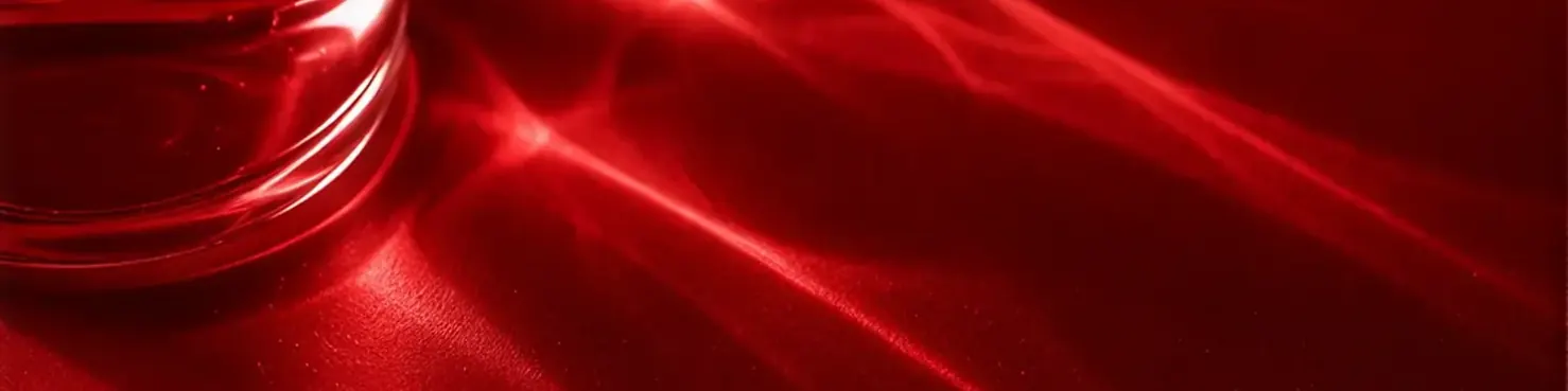 Red light refracting through glass